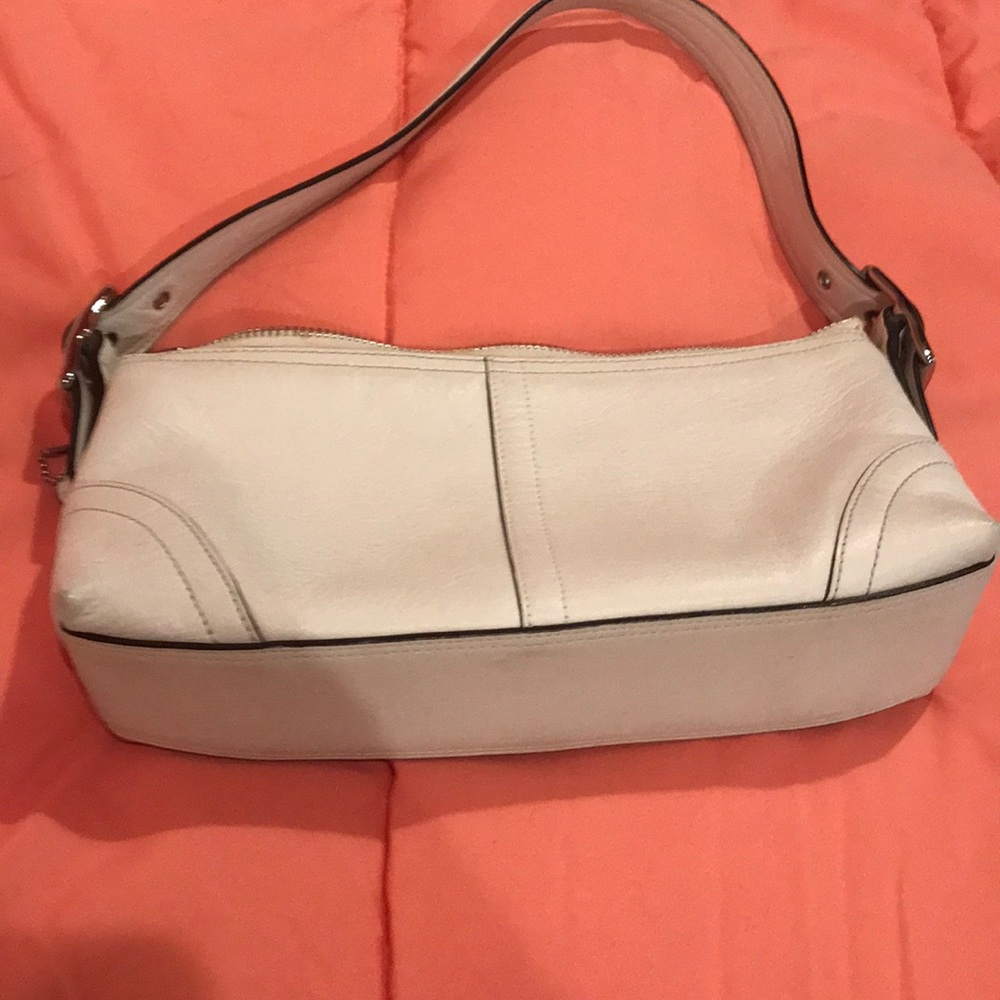Small coach purse.